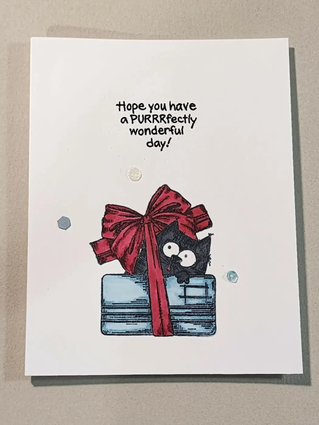 Birthday cat 2 card featuring a black cat peeking from behind a blue gift box with a red bow for simple cards