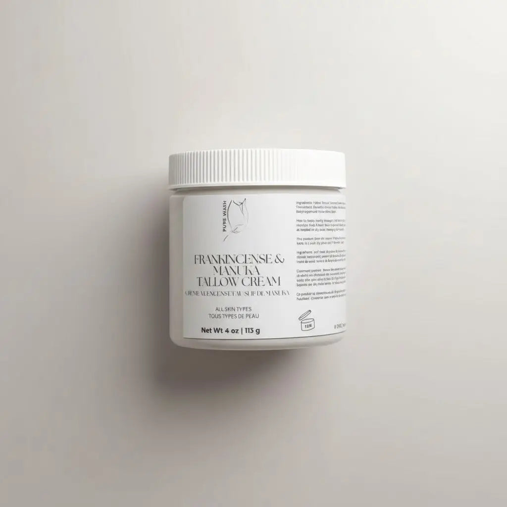 White cylindrical jar of manuka tallow cream with ribbed lid and minimalist label for skin barrier and shea butter care