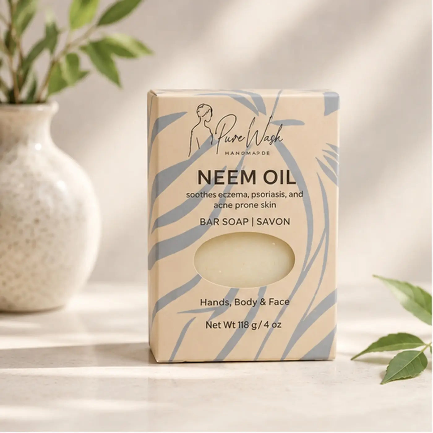 A beige and blue patterned box containing a handmade neem oil soap bar for sensitive skin body bar and facial skin conditions