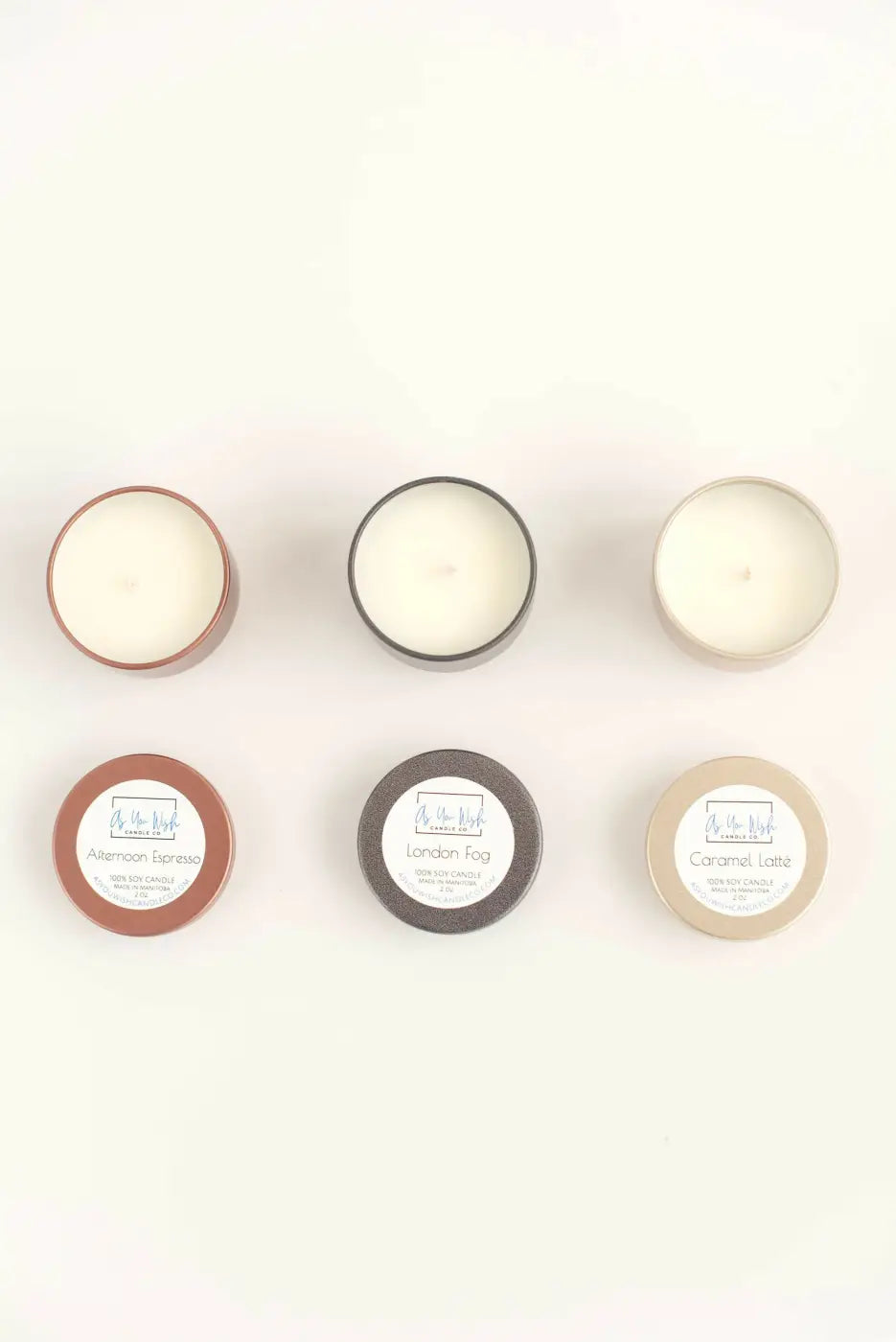 Six small round mini soy wax candle tins with white wax and labeled lids 2 oz soy candle travel size gift canada