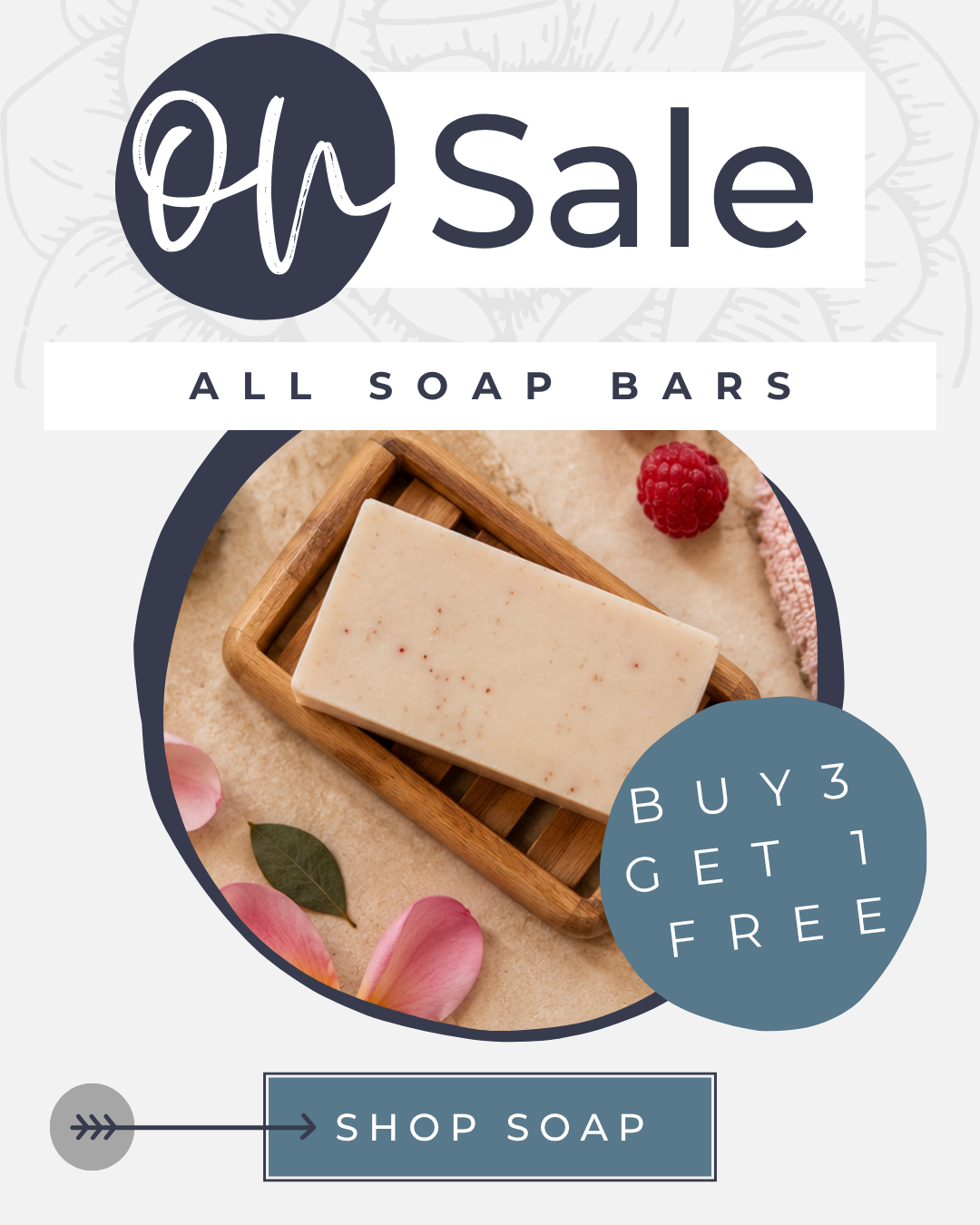 On sale, all soap bars, buy three get one free, shown with a speckled handmade soap bar on a wooden dish and fresh raspberries.