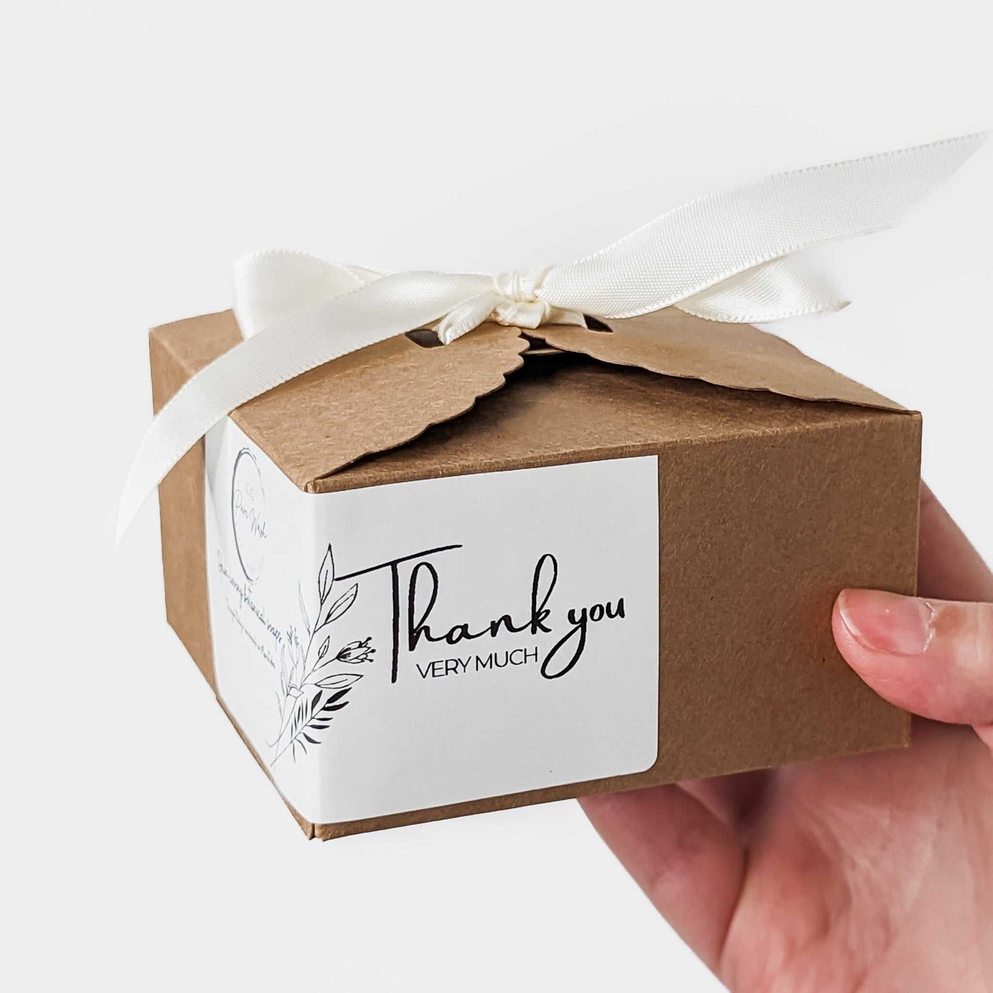 Natural, handmade soap bars from Winnipeg, Manitoba, nestled in a sustainable gift box with an elegant ribbon and appreciation note.