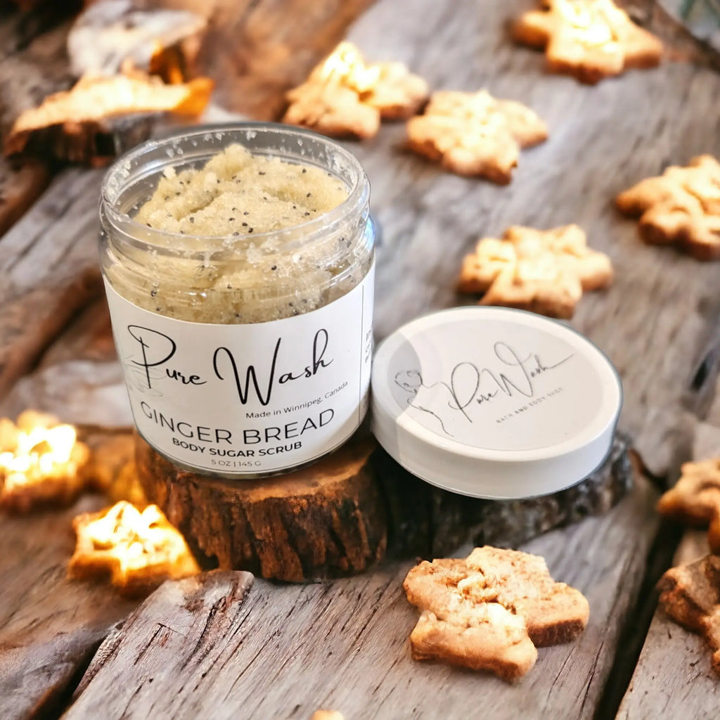 Pure Wash Whipped Body Sugar Scrub in gingerbread scent on rustic wooden surface.