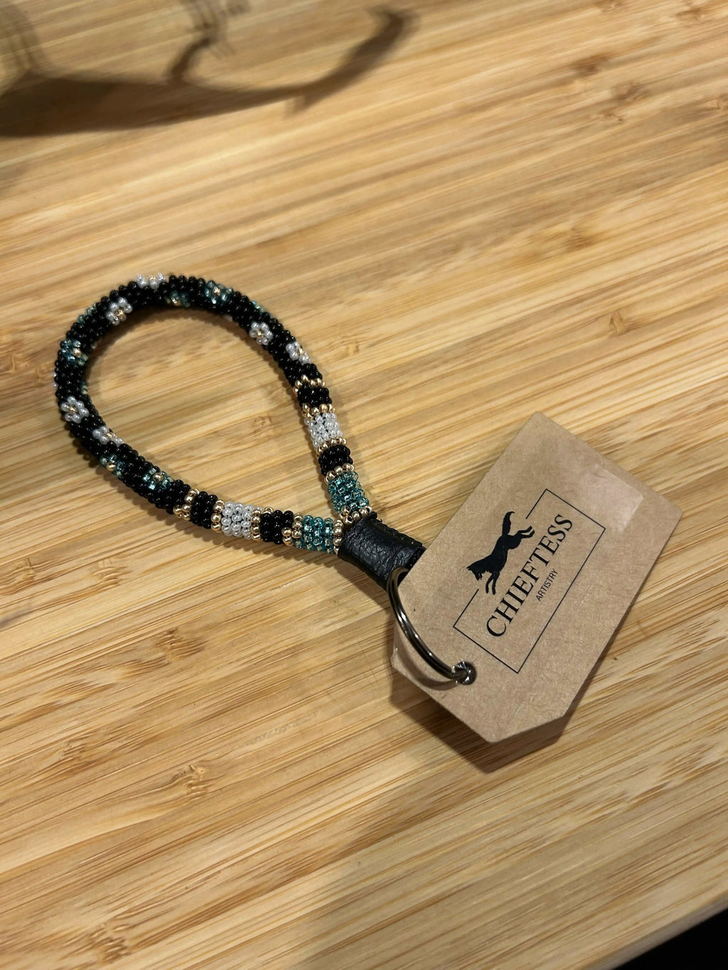 FLORAL Beaded Mini Keychain with bold flowers, leather detail, and key ring.