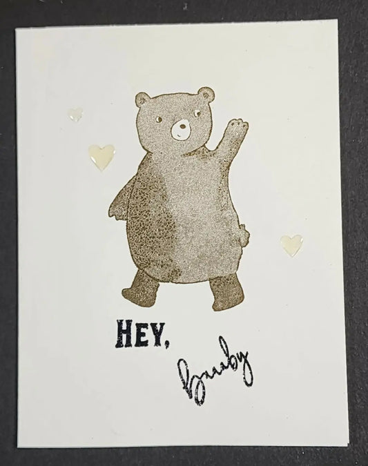 A charming brown bear illustration on a textured white card from baby 10 card simple cards collection