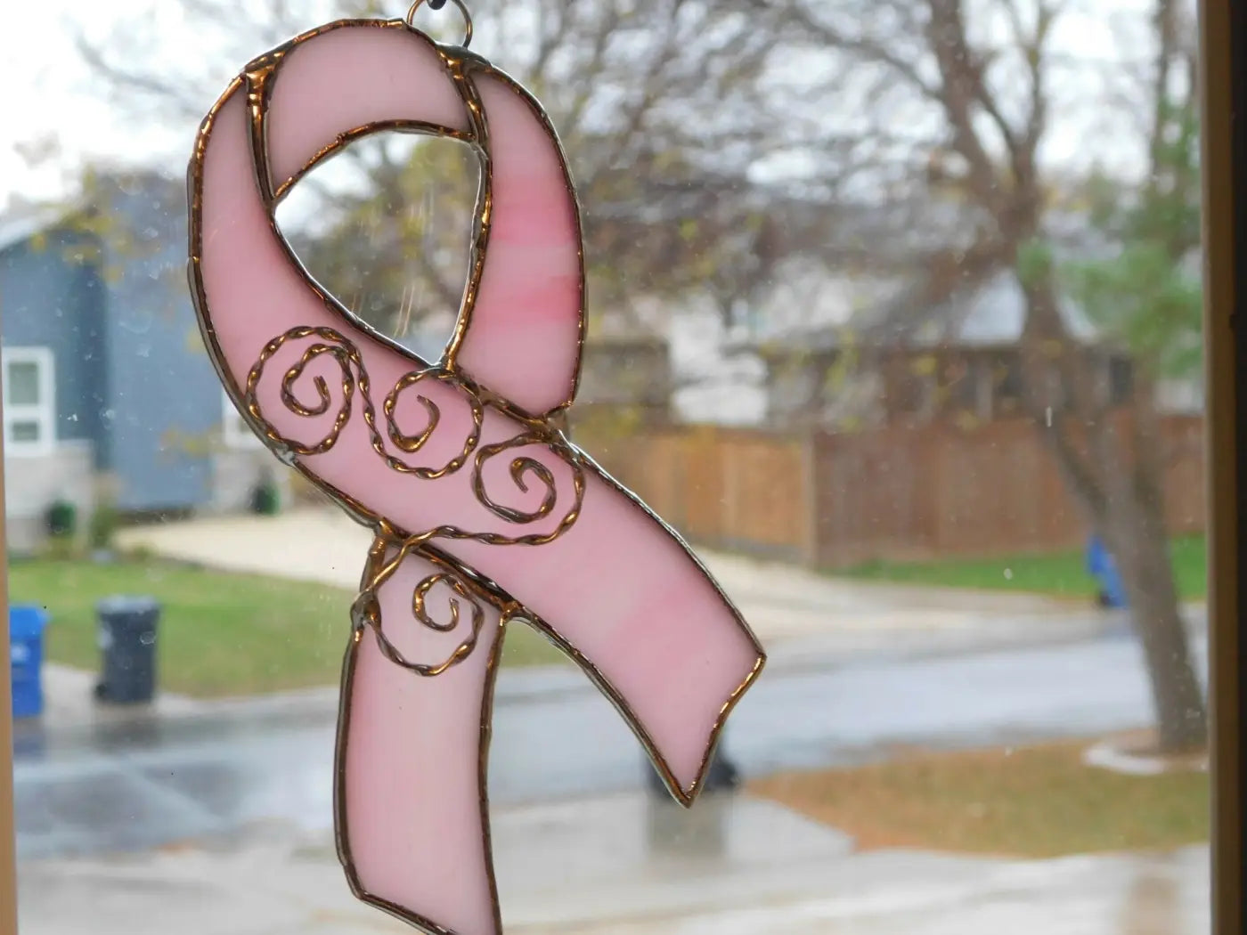 Bcam pink ribbon handcrafted suncatcher with pink stained glass and gold foil detailing for breast cancer awareness