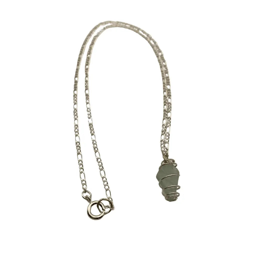 Silver-toned chain necklace with a coiled wire-wrapped green genuine glass pendant beach glass caged design