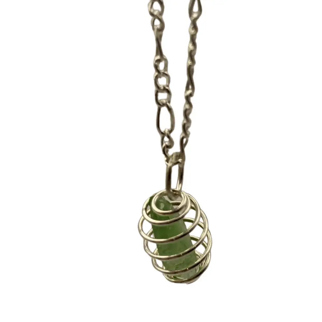 Silver wire-wrapped green aventurine beach glass caged pendant hanging from twisted chain genuine glass pendant