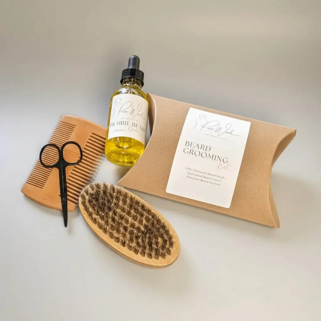 A wooden beard brush with natural bristles and a rounded oval head for effective beard grooming kit use