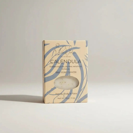 Calendula soap bar with botanical flecks in beige and blue floral box supports healthy skin and easily irritated skin