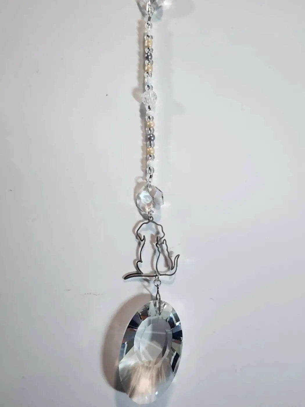 Silver wire cat silhouette hanging ornament with clear crystal beads and faceted oval prism dog long suncatcher iridescent ornament small reflective light catcher