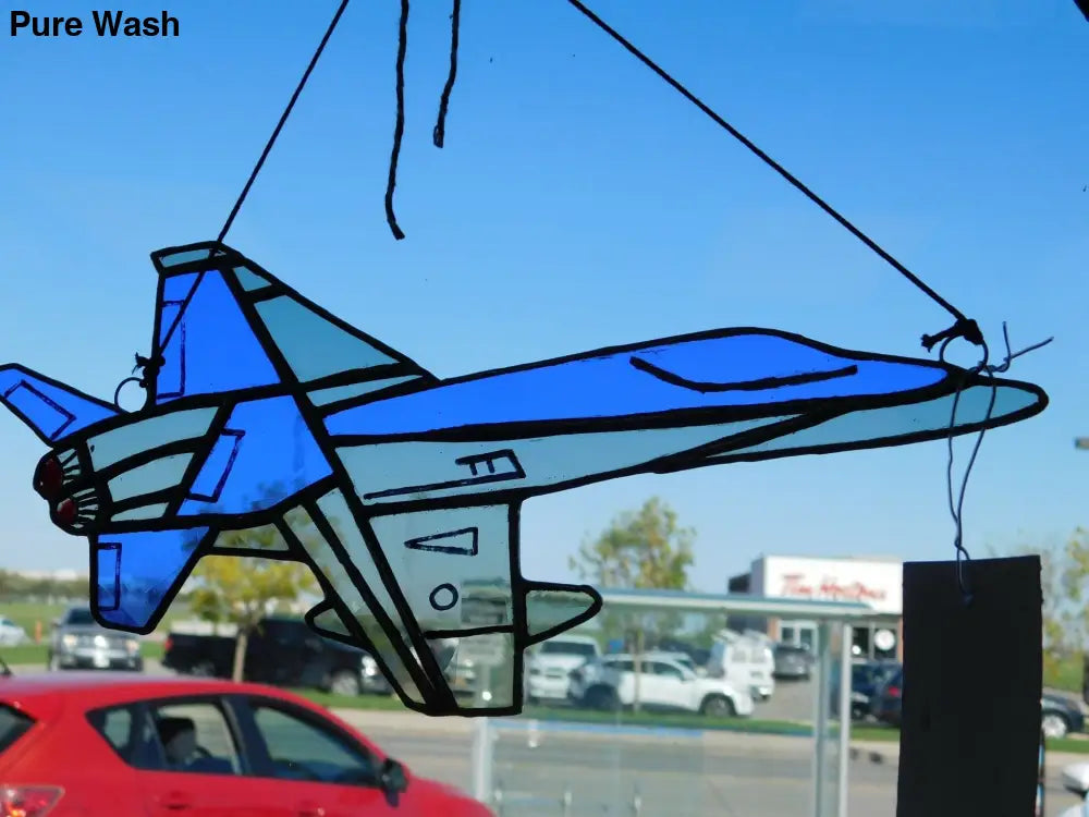 the second, cf - 18 fighter jet , same size 11L x 7 w , but blue & grey I loved making these, hand painted details, together, this & the gray one looks ideal - Pure Wash Canadian Made - Winnipeg