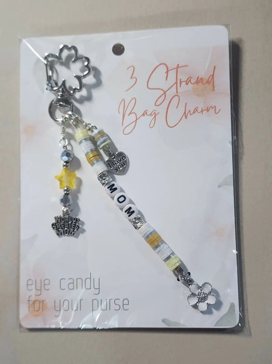 Silver floral bag charm with three bead strands and mom bead centerpiece, ideal for handmade soap Canada gifts