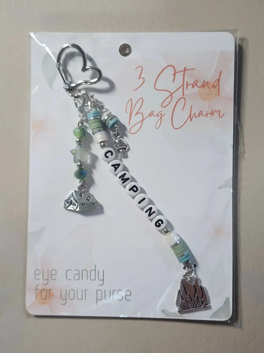 Silver heart-shaped clip bag charm with camping-themed bead strands, ideal for direct sunlight use and handmade soap canada gifts
