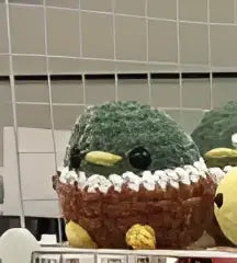 Green crocheted chonky mallard duck plush toy with brown nest and white trim handmade soap canada pure wash accessory