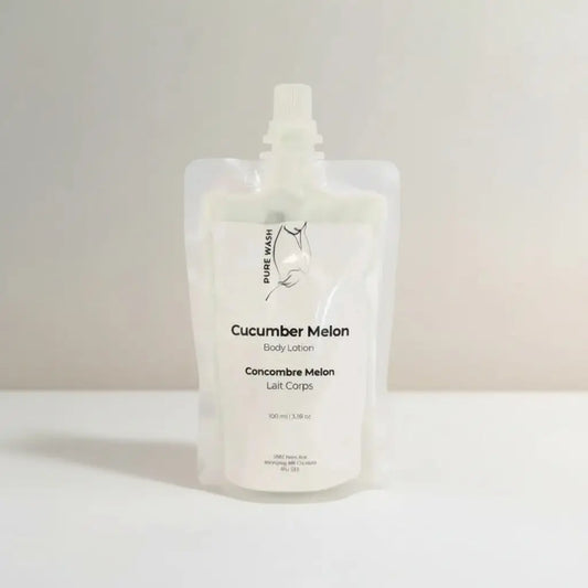 A translucent white shea butter refill pouch of cucumber melon body lotion with minimalist label and kernel oil hand care