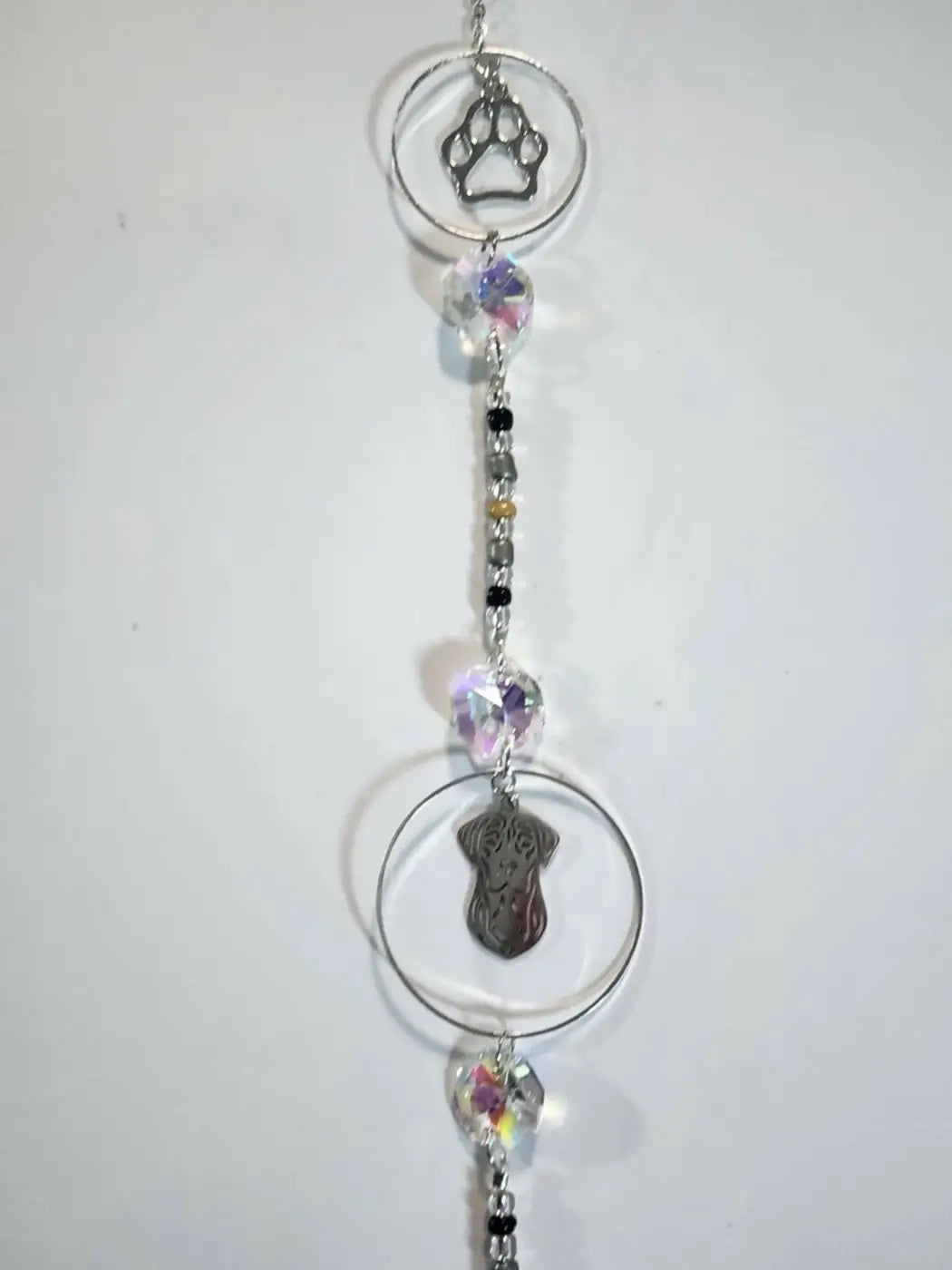 Silver-toned dog 1 long suncatcher with paw print charm crystal beads and dog face pendant iridescent ornament