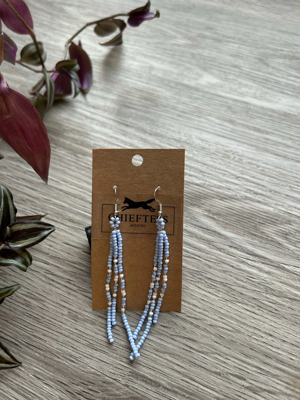 Dangle beaded earrings with three delicate strands, 3 inches long.