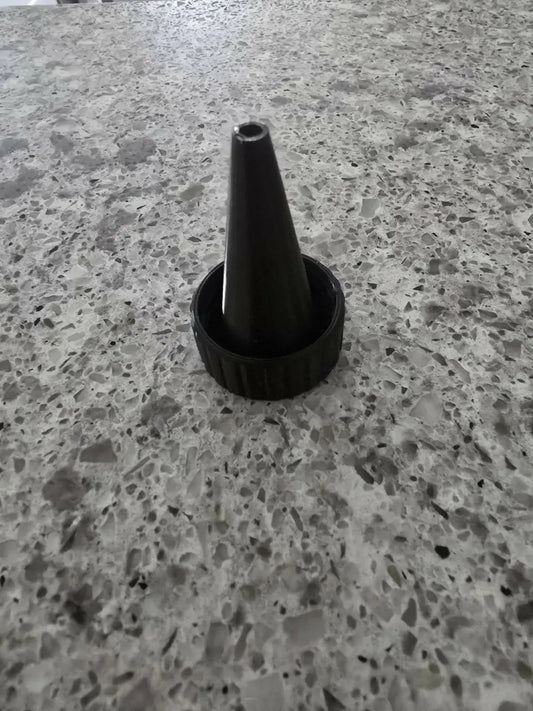 Black plastic bottle cap with conical nozzle for fruit fly trap designed to capture and control fruit flies efficiently