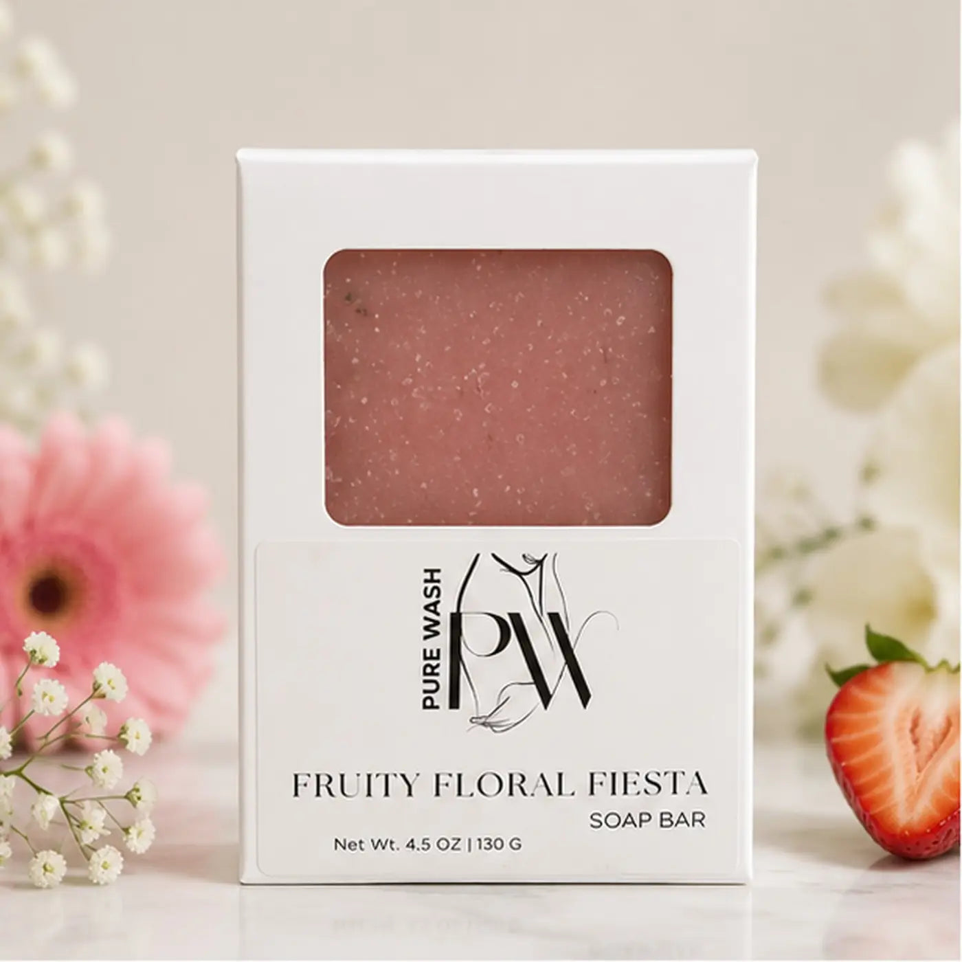 A pink speckled fruity floral fiesta soap bar in a white box from rocky mountain soap for a handmade shower routine