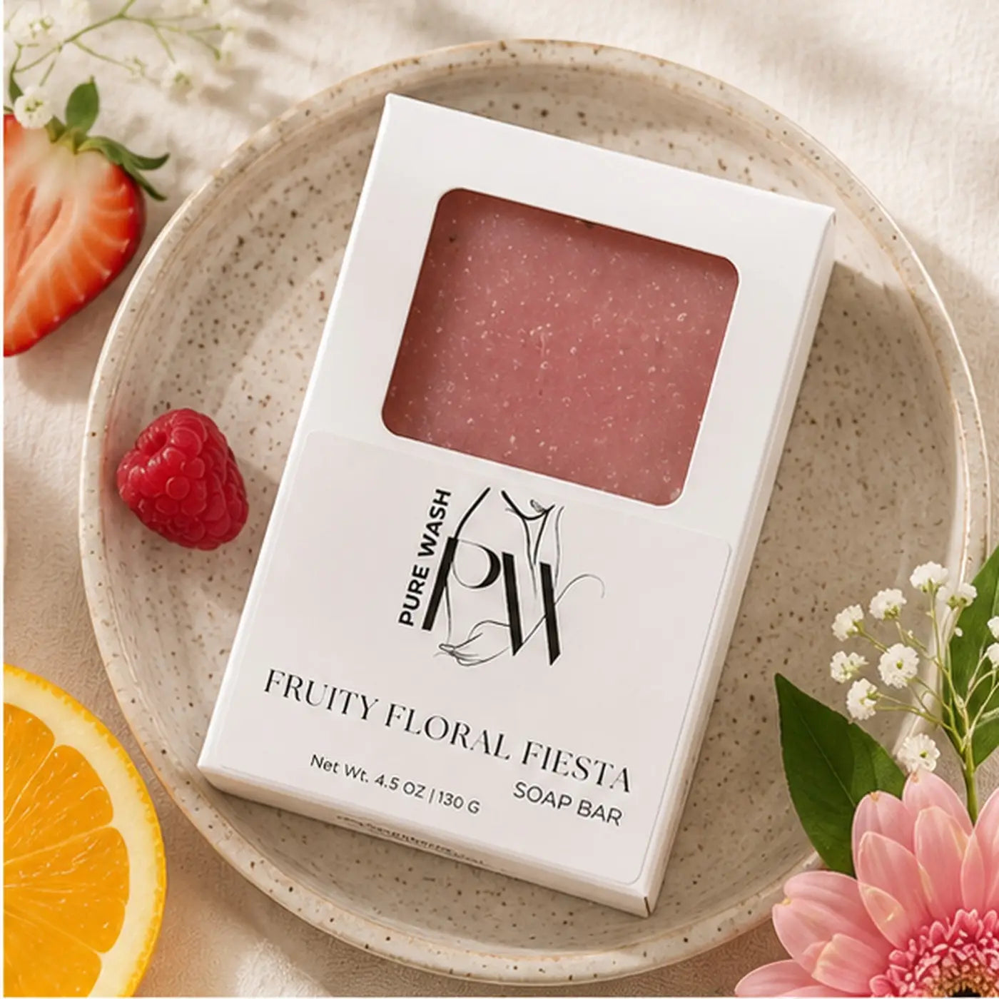 A pink speckled fruity floral fiesta soap bar in a white box ideal for a handmade shower routine by rocky mountain soap