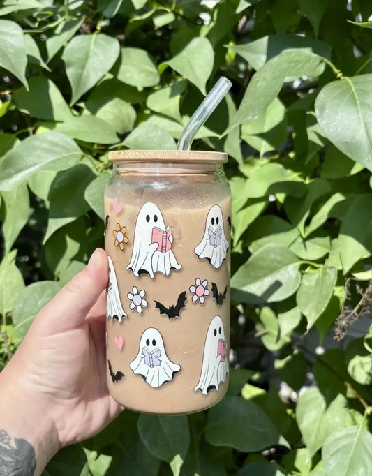 Clear glass ghosts glass cup with bamboo lid and straw decorated with white ghost illustrations, dishwasher safe