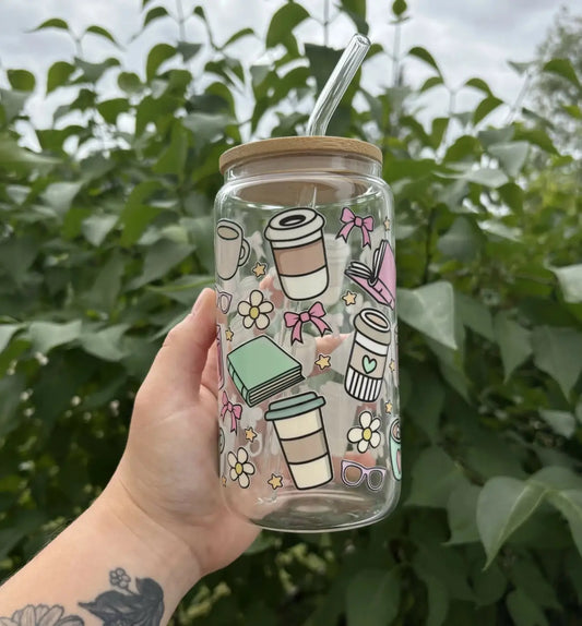 Clear glass girly bookish glass cup with wooden lid colorful cartoon illustrations and a glass straw