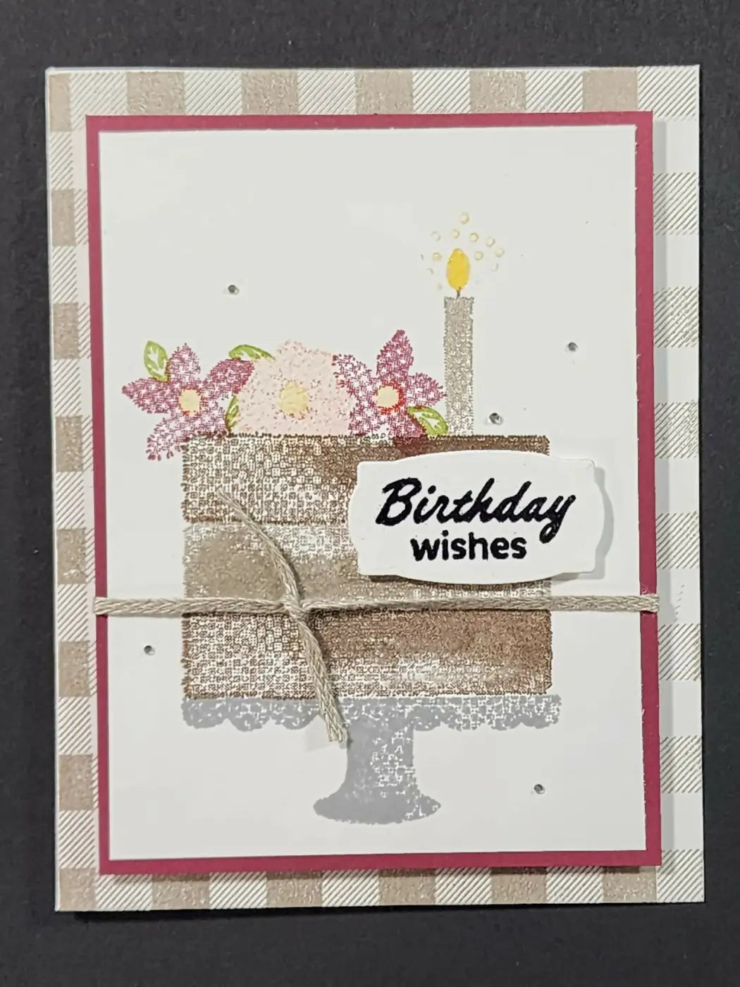 Birthday card featuring a stamped cake with glittery gold and silver layers and floral accents for canadian made skincare gifts