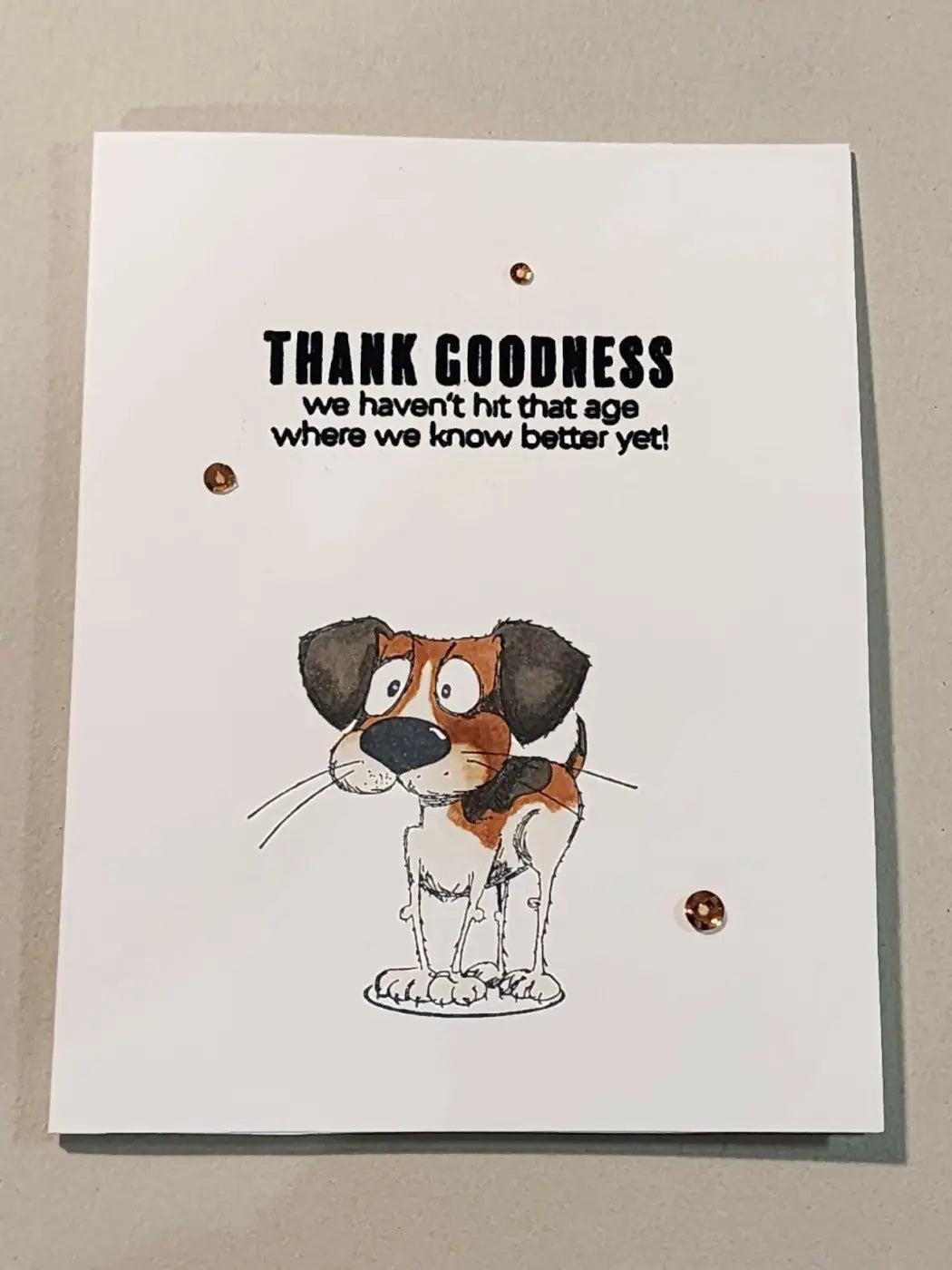 A white greeting card with a cartoon beagle standing on hind legs, ideal for canadian made skincare gifts or natural skincare canada promotions