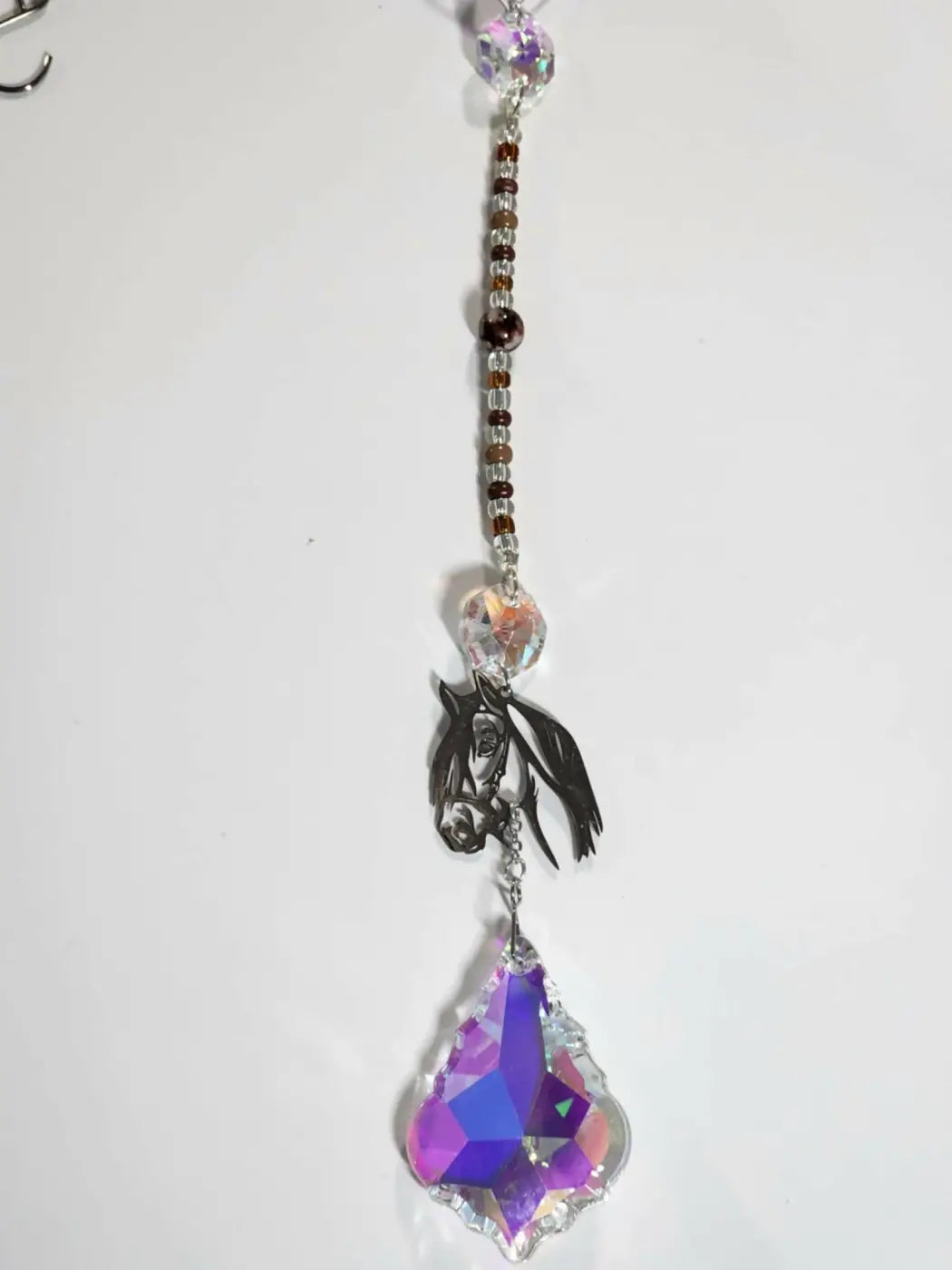Horse long suncatcher with black metal horse head charm and iridescent ornament teardrop crystal pendant