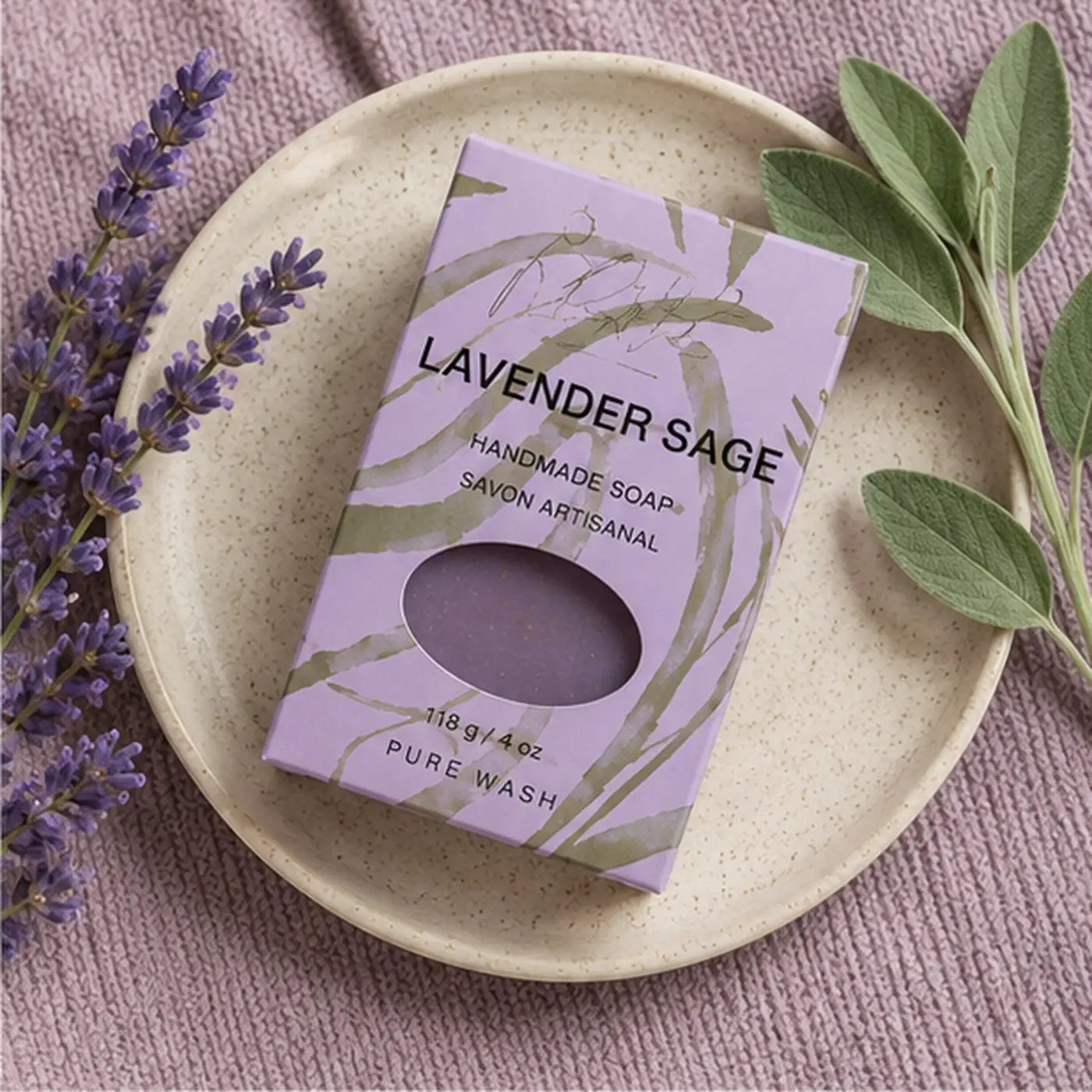 Lavender sage soap bar in a purple box with green botanical design scented with clary sage and palm oil weighing 118g