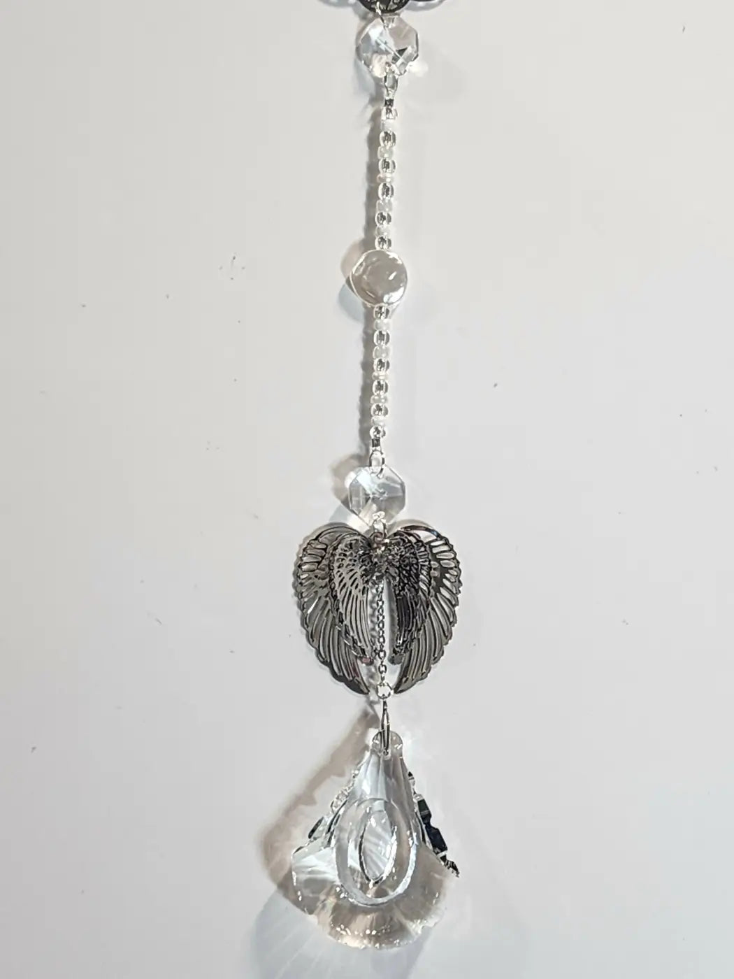 Long 5 clear crystal sun catcher with silver angel wing charm and teardrop crystals for direct sunlight with suction cup