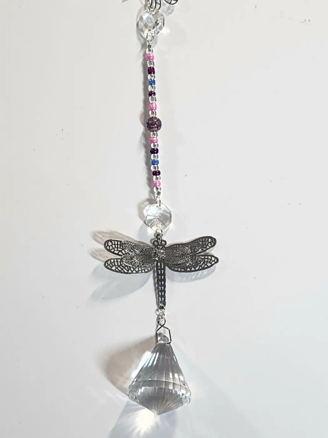 Long 7 delicate silver dragonfly suncatcher with filigree wings and colorful beads, ideal for direct sunlight use with suction cup