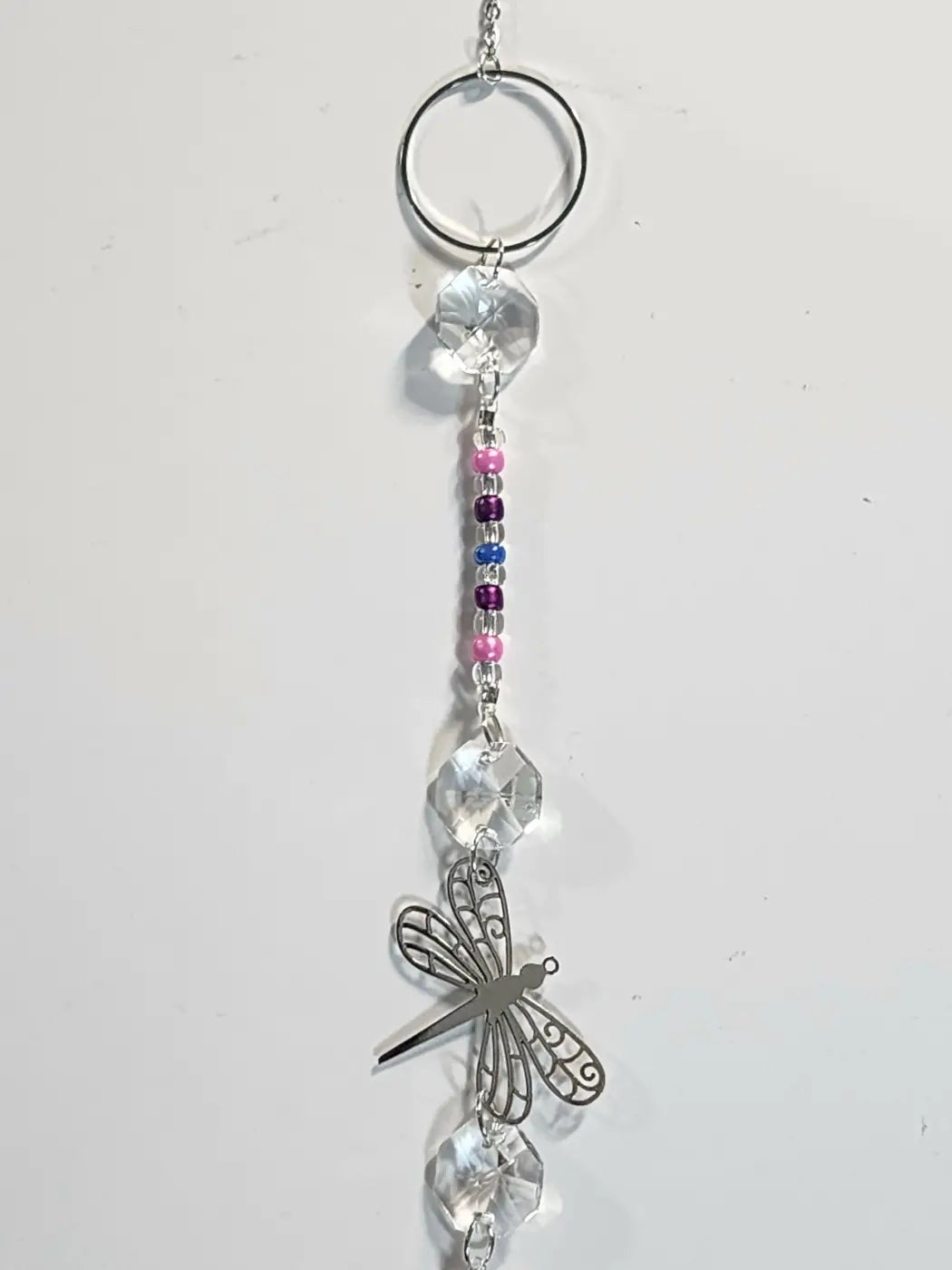 Long 7 silver dragonfly hanging ornament with clear crystal and colorful beads ideal for suction cup display in direct sunlight