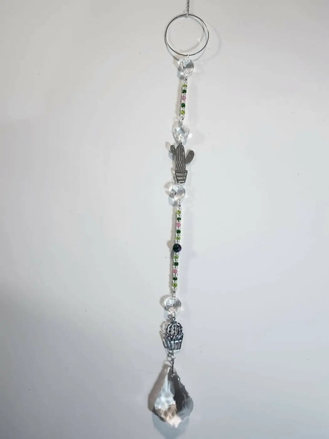 Long suncatcher with clear crystal facets silver-toned cactus charm and teardrop prism ideal for direct sunlight display