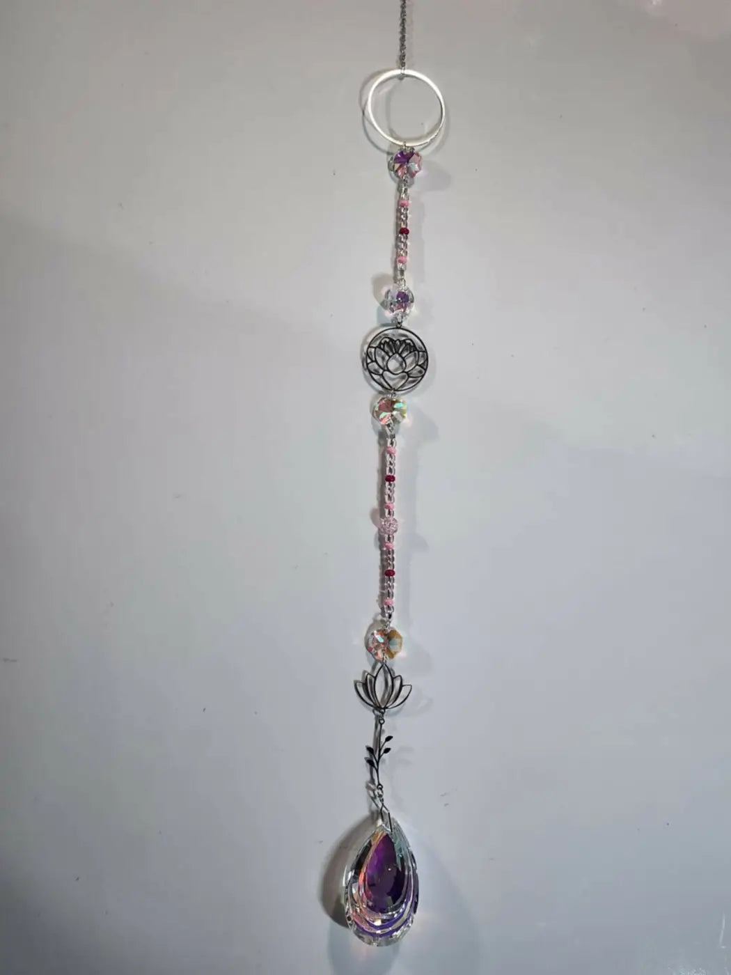 Long suncatcher with silver tone, teardrop purple crystal, pink and clear crystals, ideal for direct sunlight display
