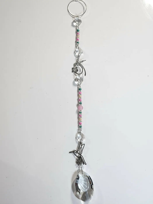 Long suncatcher with hummingbird silver wire charm, clear crystal beads, pink and green accents for direct sunlight use