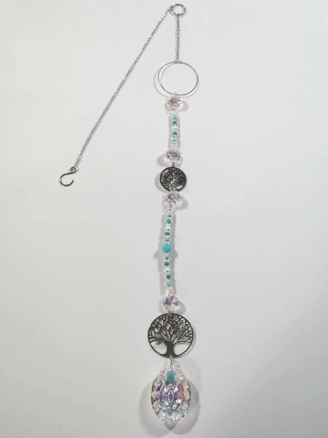 Long suncatcher with silver tree of life charms and clear turquoise pink beads designed for direct sunlight display