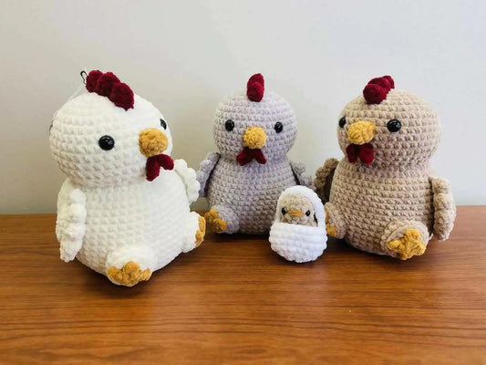 Crocheted mama chicken family set with white gray beige hens and chick in matching nest perfect for handmade soap canada gifting