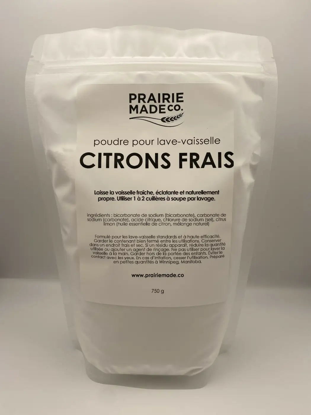 White resealable pouch of Prairie Made Co natural dishwasher powder with prairie pure citrus scent for eco-friendly cleaning