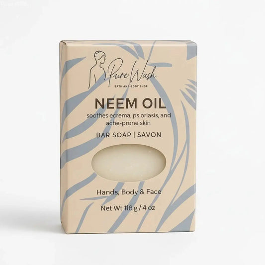 A beige and light blue patterned box containing a white neem oil soap bar from pure wash bath and body shop for sensitive skin body bar and facial skin conditions