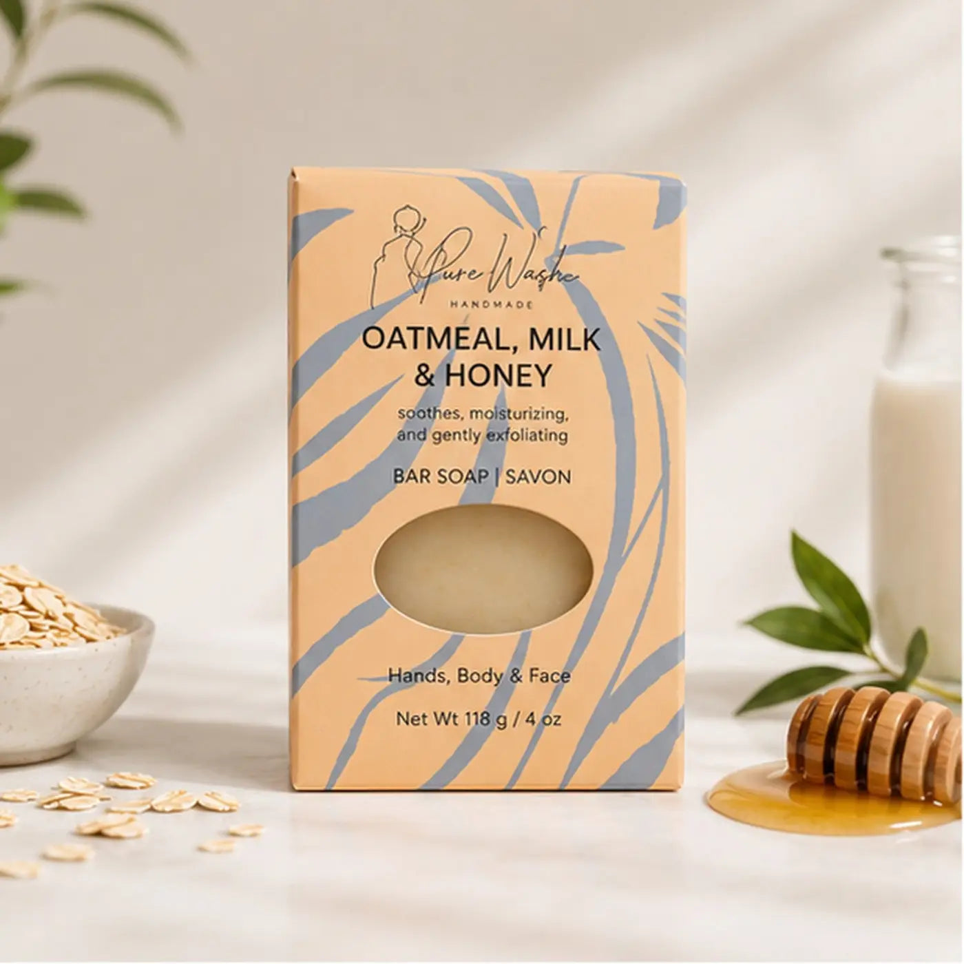 A beige oatmeal milk and honey soap bar in a peach box with blue leaf patterns ideal for dry skin care