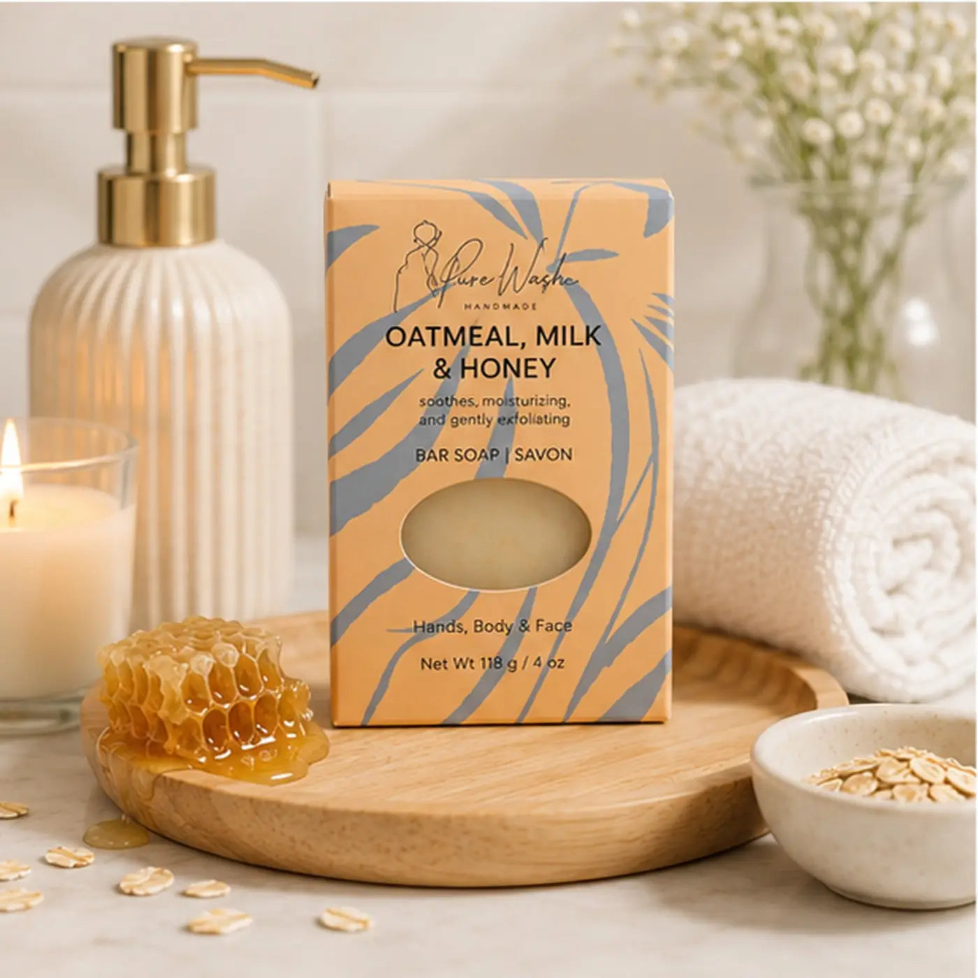 Handmade oatmeal milk and honey soap bar in a peach box with blue leaf patterns ideal for dry skin care