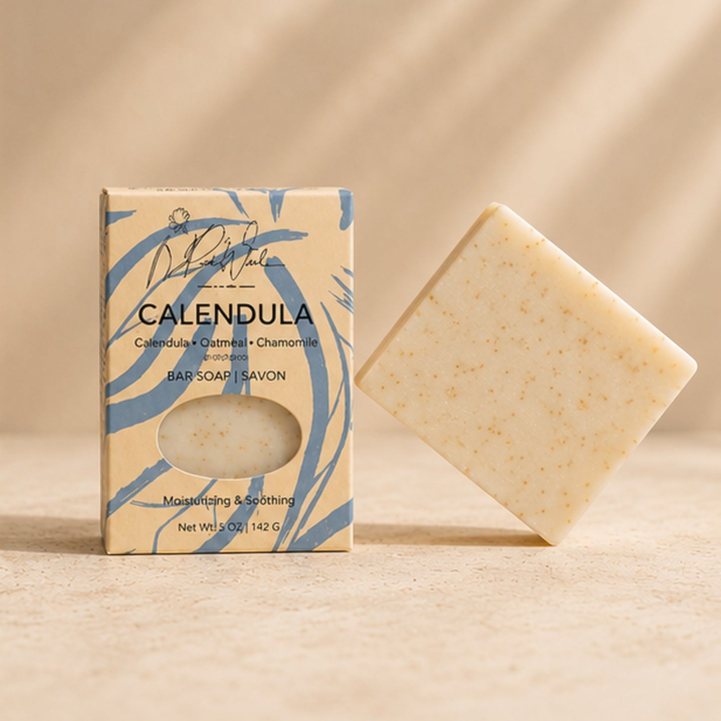 Pure Wash Calendula soap bar with oatmeal and chamomile in beige packaging on a neutral surface.