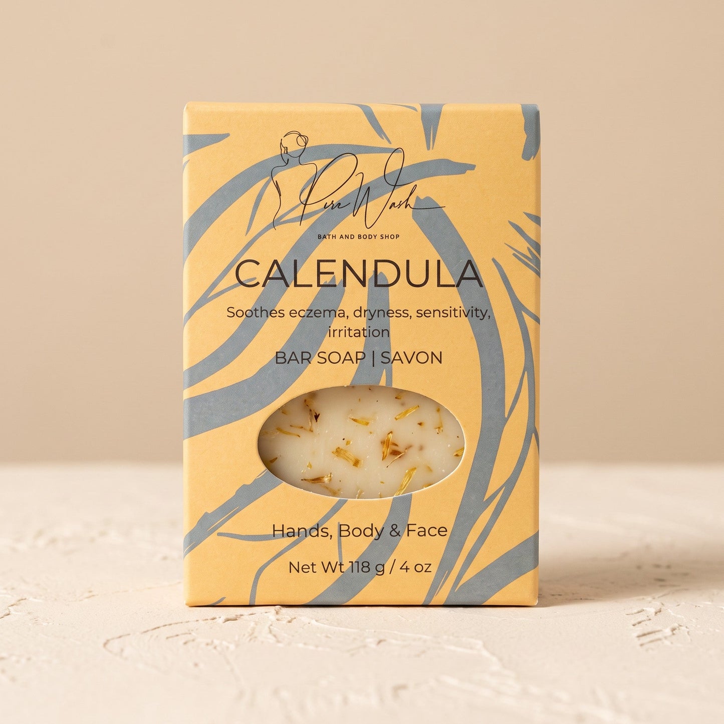 Pure Wash Calendula soap bar in yellow packaging with visible flower petals for sensitive skin