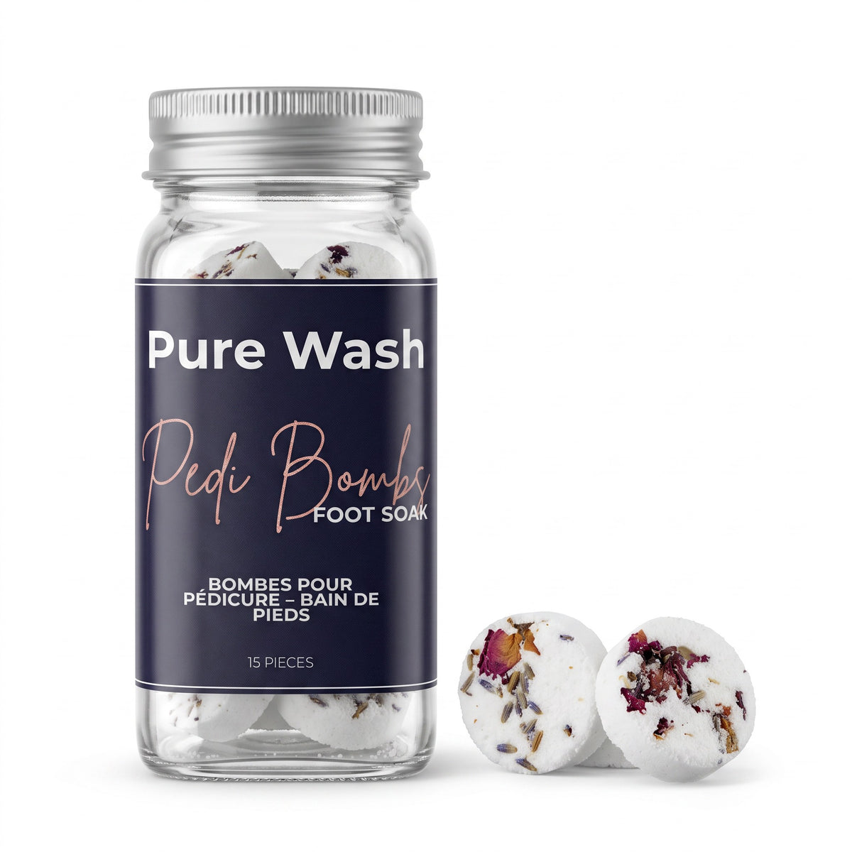 Pure Wash Pedi Bombs in a glass jar with floral-infused foot soak tablets featuring dried rose petals and lavender.