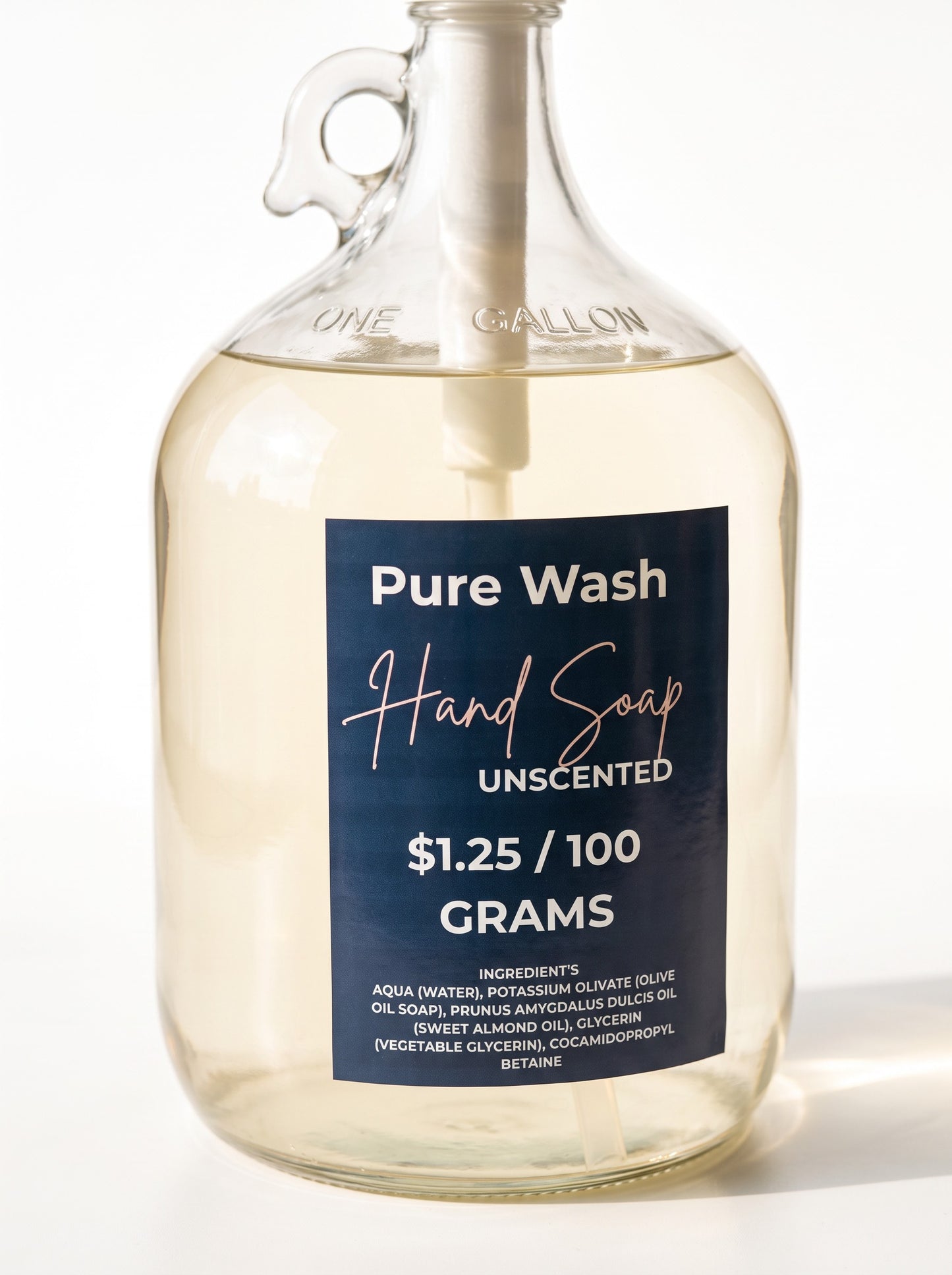 Pure Wash unscented plant-based liquid hand soap in a large one-gallon glass refill jug with a pump dispenser.