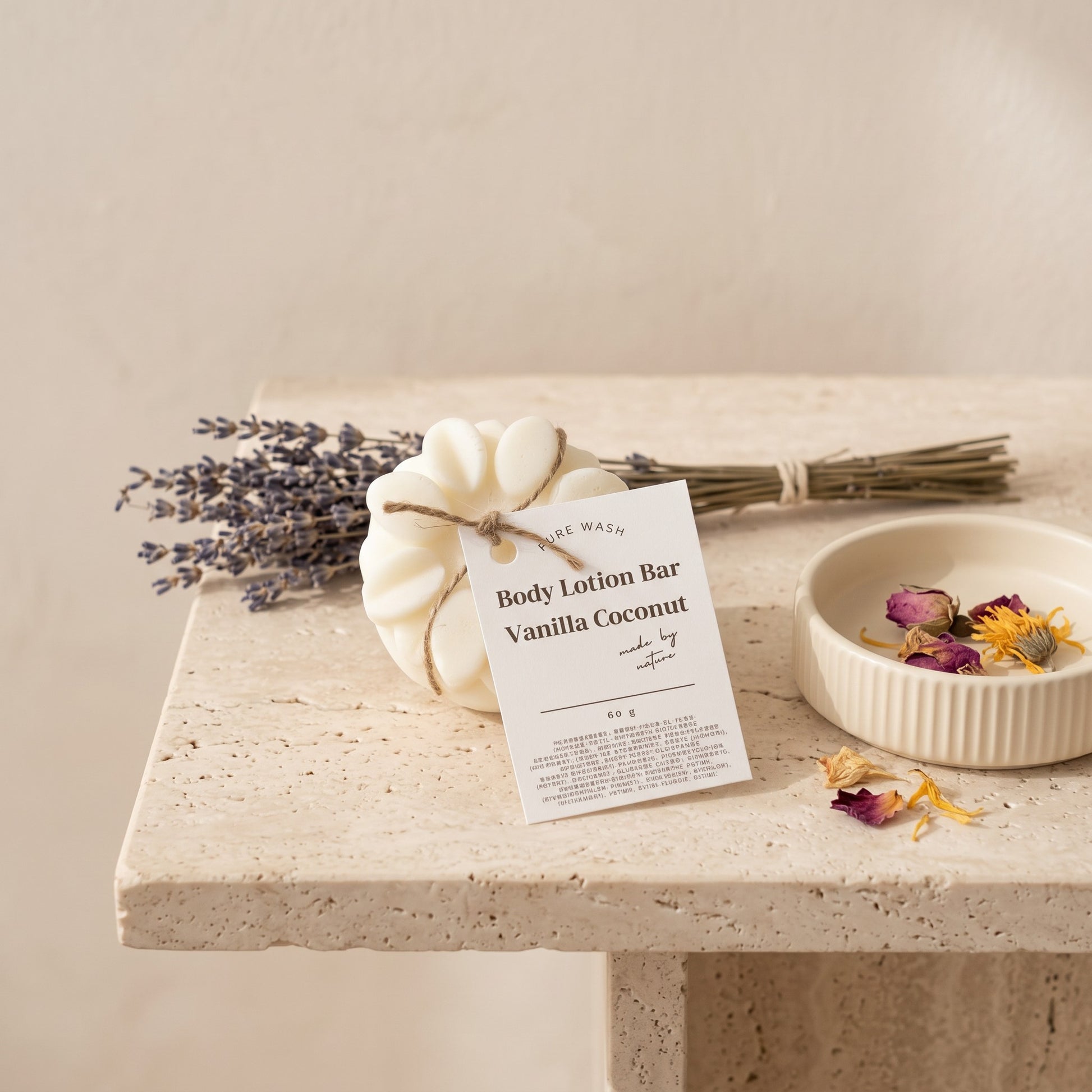 Pure Wash solid Vanilla Coconut body lotion bar with shea butter and coconut oil on a stone table with dried flowers