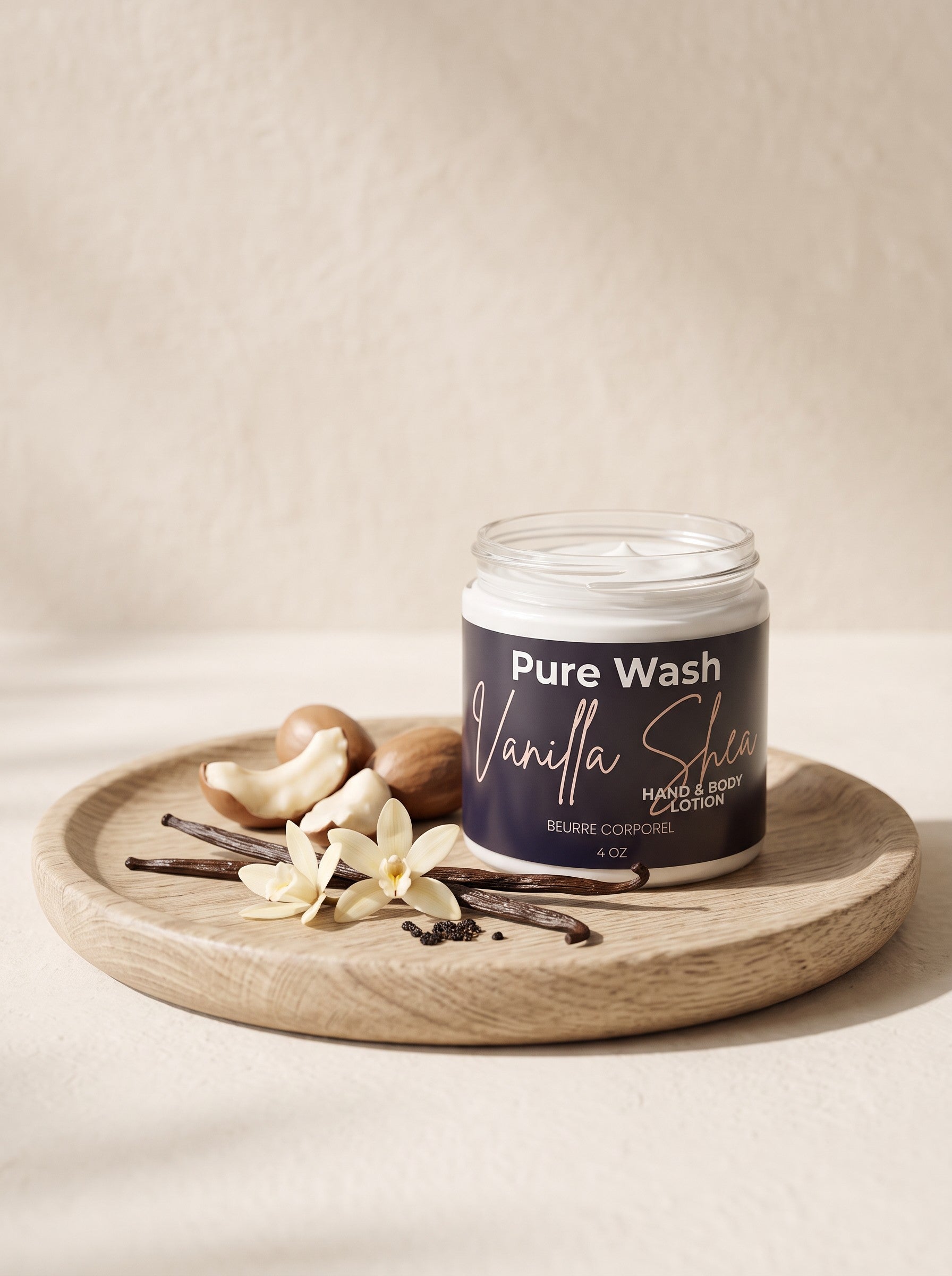 Pure Wash Vanilla Shea body and hand lotion in a glass jar on a wooden tray with vanilla beans and shea nuts.
