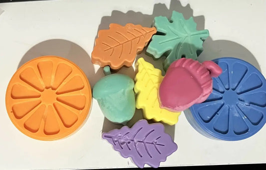 Colorful autumn-themed refillery soy wax large melts in orange green yellow pink and purple with leaf and acorn designs plastic-free soy wax fragrances free